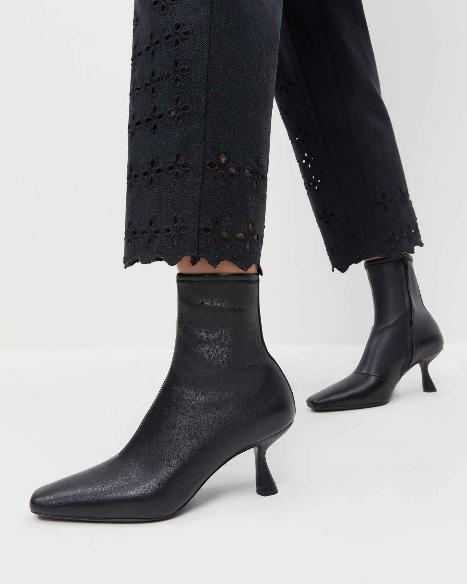 Thandy Black Leather Curved Heel Bootie | Loeffler Randall Women